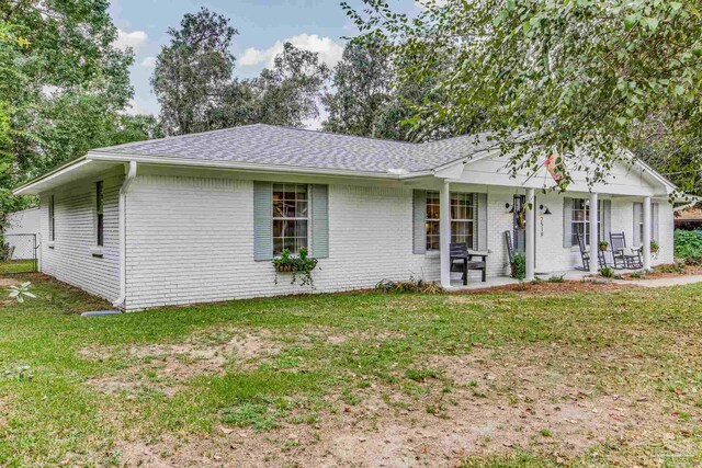 2519 Inda Ave, Pensacola, FL 32526 - single story home with brick siding, roof with shingles, and a front lawn