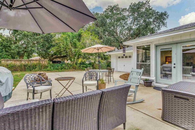2519 Inda Ave, Pensacola, FL 32526 - view of patio / terrace with a grill, outdoor dining space, and fence