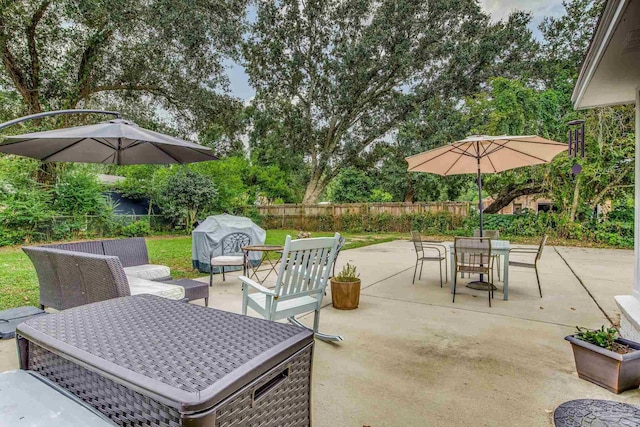 2519 Inda Ave, Pensacola, FL 32526 - view of patio / terrace with a fenced backyard, outdoor dining space, and grilling area