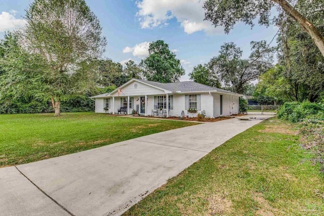 2519 Inda Ave, Pensacola, FL 32526 - single story home featuring a front yard, brick siding, and covered porch