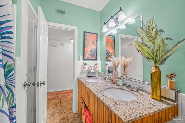 bathroom featuring vanity and tile patterned flooring