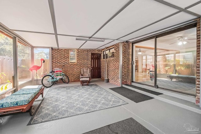 sunroom / solarium with ceiling fan