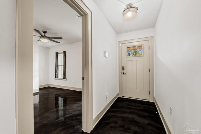 doorway to outside featuring ceiling fan and a healthy amount of sunlight