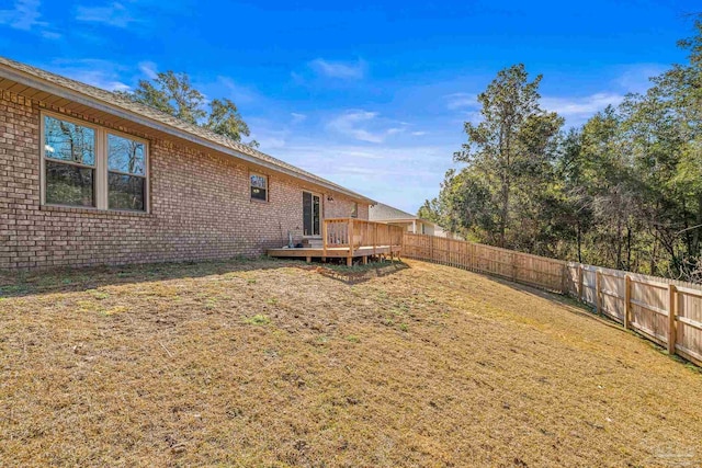 view of yard with a deck