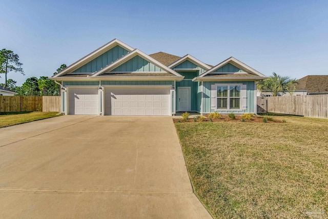 craftsman-style house with a front lawn and a garage