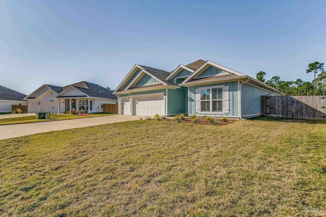 view of front facade with a garage and a front yard