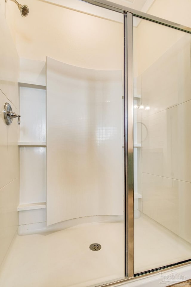 bathroom with an enclosed shower