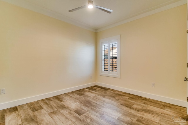 unfurnished room with ceiling fan, hardwood / wood-style floors, and ornamental molding