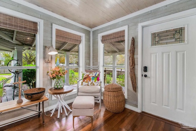 sunroom / solarium with a wealth of natural light and wooden ceiling