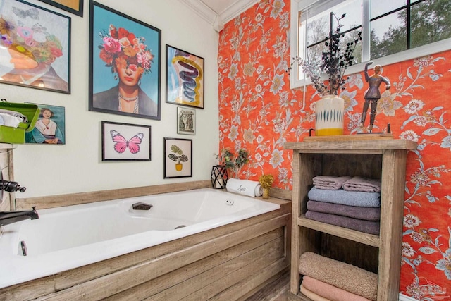 bathroom featuring a washtub and ornamental molding