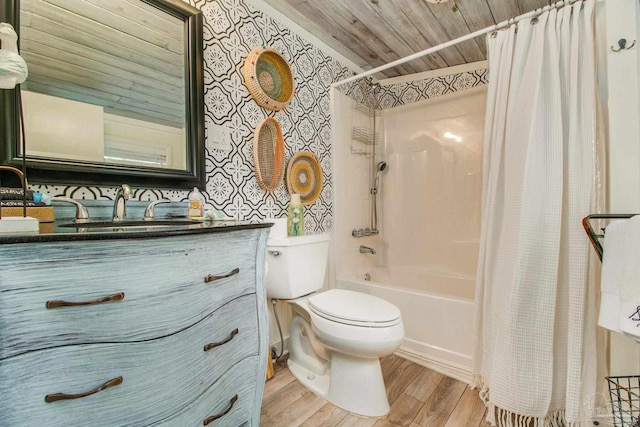 full bathroom featuring hardwood / wood-style flooring, wooden ceiling, vanity, toilet, and shower / bathtub combination with curtain