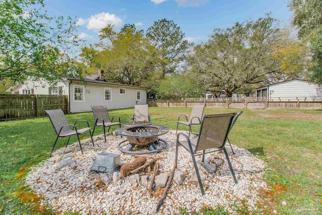 exterior space with an outdoor fire pit