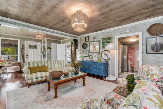 living room featuring hardwood / wood-style flooring, wood ceiling, and ornamental molding