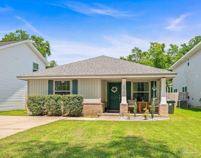8820 Smiley Ct, Pensacola, FL 32514 - view of front of property featuring a porch, roof with shingles, and board and batten siding
