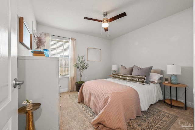 8820 Smiley Ct, Pensacola, FL 32514 - carpeted bedroom with baseboards and a ceiling fan