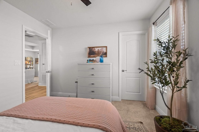 8820 Smiley Ct, Pensacola, FL 32514 - bedroom featuring light carpet and ceiling fan
