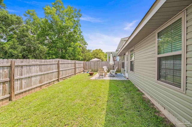 8820 Smiley Ct, Pensacola, FL 32514 - fenced backyard featuring a patio