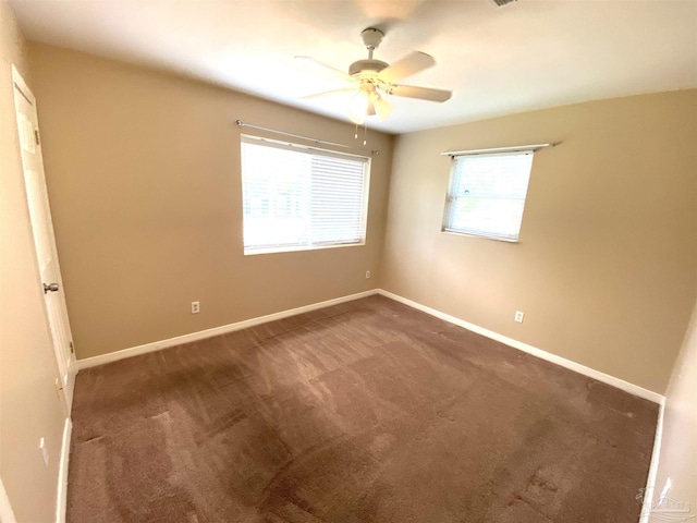 925 Artesian Ave, Pensacola, FL 32505 - unfurnished bedroom with carpet flooring, baseboards, and ceiling fan