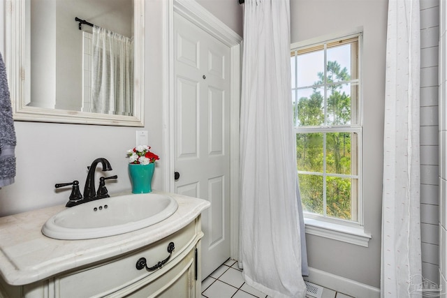 bathroom featuring tile patterned floors and vanity