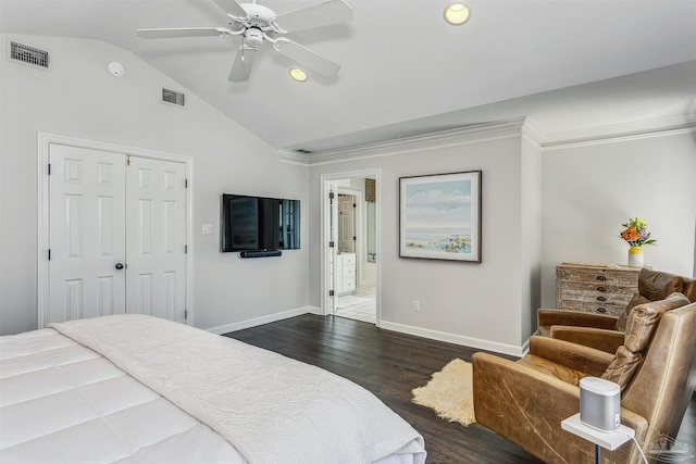 bedroom featuring ceiling fan, dark wood-type flooring, crown molding, lofted ceiling, and a closet