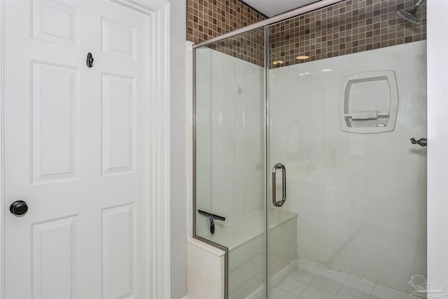 bathroom with an enclosed shower