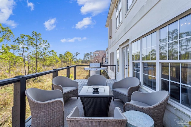 balcony featuring an outdoor hangout area and area for grilling