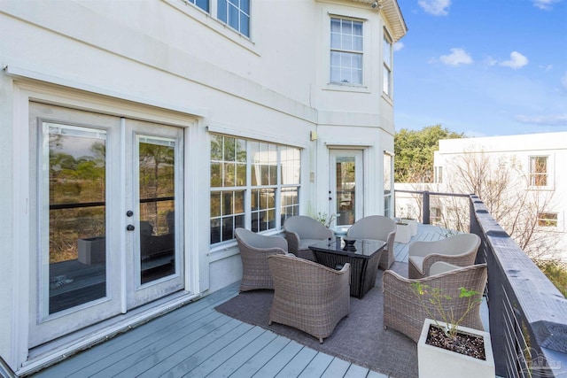 deck featuring an outdoor hangout area and french doors