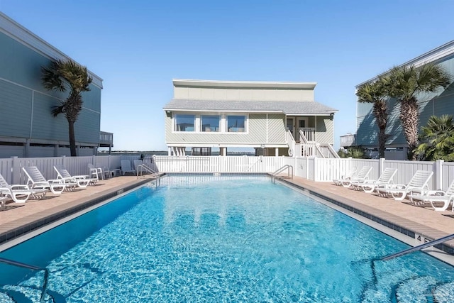 view of pool featuring a patio area