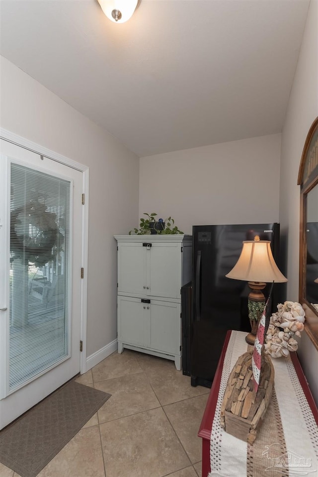 interior space with light tile patterned floors