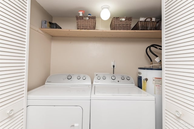 washroom featuring separate washer and dryer and water heater