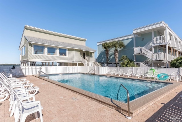 view of pool featuring a patio area