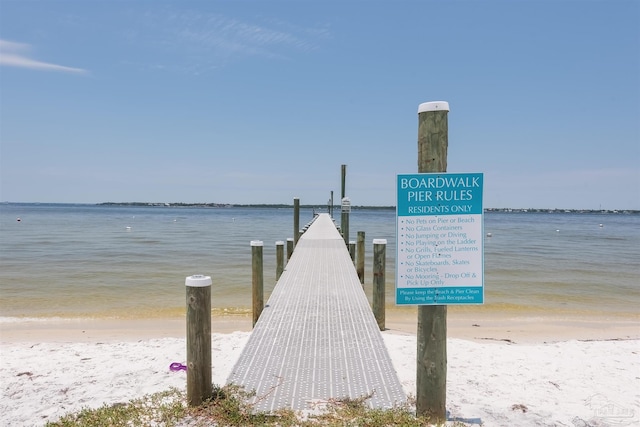 dock area featuring a water view