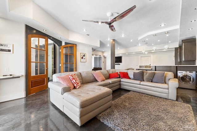 999 Ft Pickens Rd Unit 309, Pensacola Beach, FL 32561 - living room featuring ceiling fan, washer / clothes dryer, and a textured ceiling