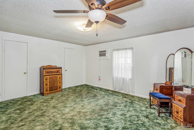 sitting room featuring carpet flooring, ceiling fan, and a textured ceiling