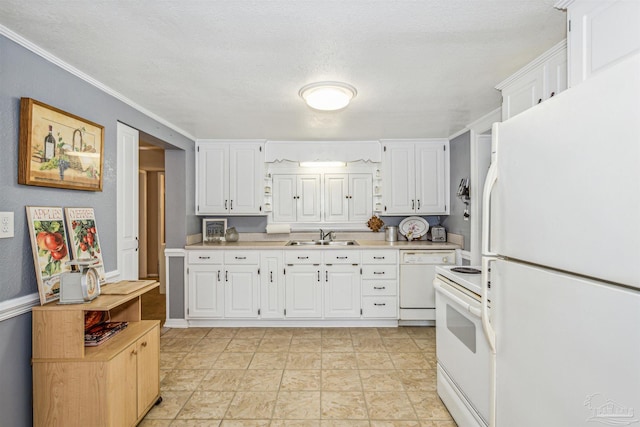 kitchen with a textured ceiling, white appliances, white cabinetry, and sink