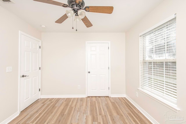 unfurnished bedroom featuring ceiling fan and light hardwood / wood-style flooring