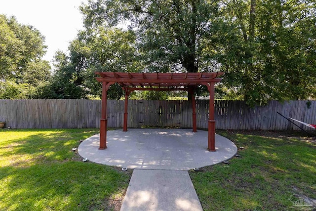 view of yard with a fenced backyard and a patio