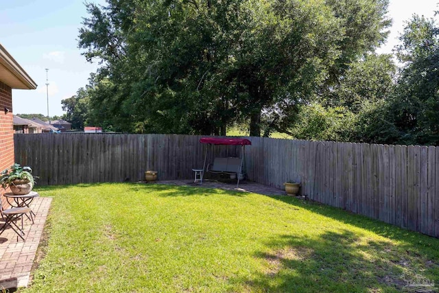 view of yard featuring a fenced backyard