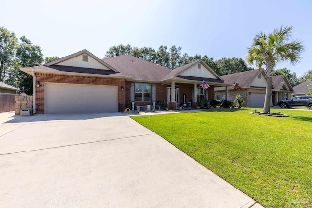 view of front facade featuring driveway, a garage, fence, a front lawn, and brick siding