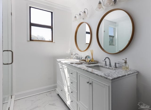 bathroom featuring vanity and ornamental molding