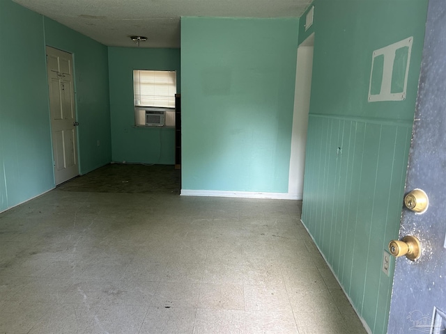 empty room with tile patterned floors