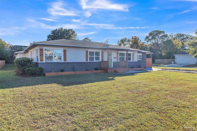 ranch-style home with a front lawn