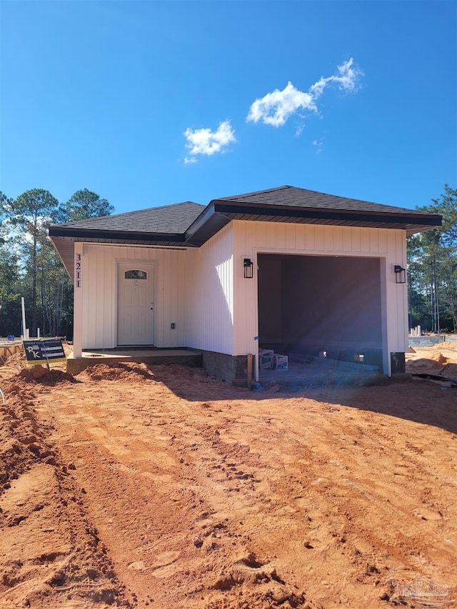 exterior space with a garage