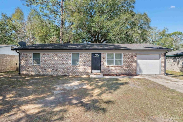 ranch-style home featuring brick siding, driveway, and an attached garage