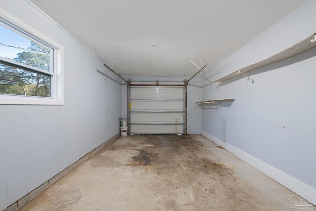 garage with baseboards