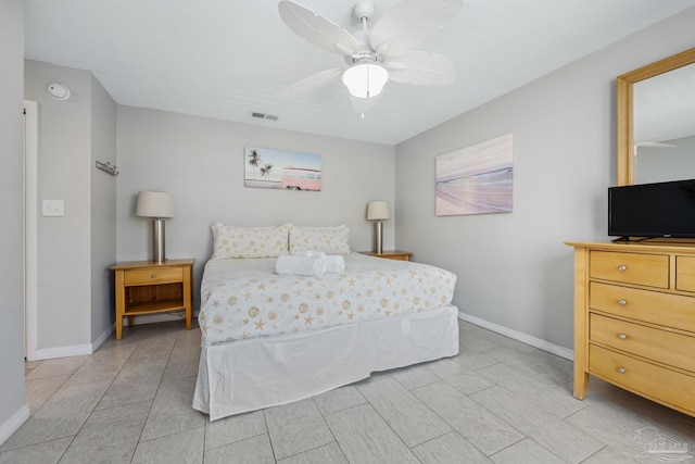 8425 Gulf Blvd Unit 213, Navarre Beach, FL 32566 - bedroom with baseboards and a ceiling fan