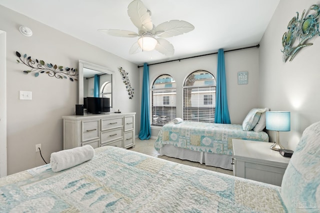 8425 Gulf Blvd Unit 213, Navarre Beach, FL 32566 - bedroom featuring light tile patterned flooring and ceiling fan