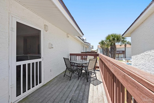 8425 Gulf Blvd Unit 213, Navarre Beach, FL 32566 - deck featuring outdoor dining area