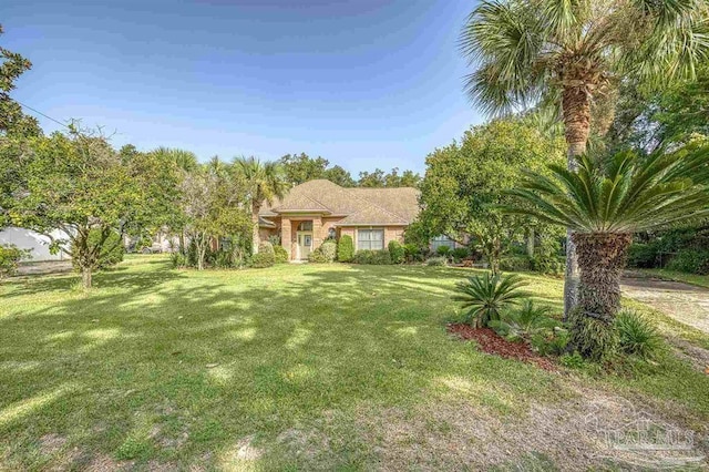 view of front of property with a front lawn