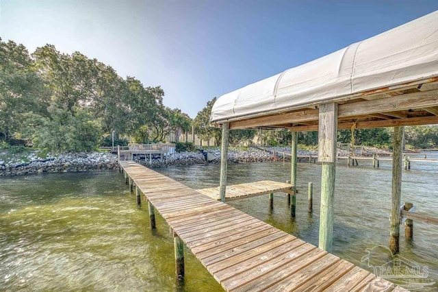 view of dock featuring a water view